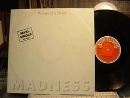 MADNESS / WINGS OF A DOVE
